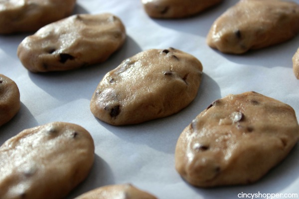 Chocolate Chip Cookie Dough Easter Eggs- edible chocolate chip cookie dough shaped in to an egg shape and then dipped in chocolate. Perfect homemade Easter candy.